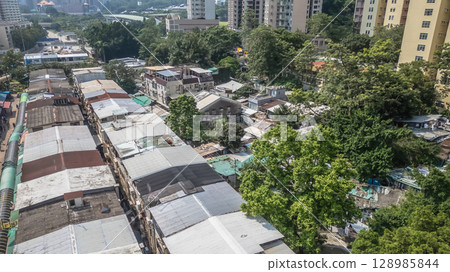 July 26 2025 Urban Neighborhood with Buildings and Market Stalls 128985844
