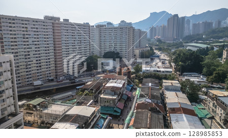 July 26 2025 Urban Neighborhood with Buildings and Market Stalls 128985853