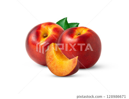 Juicy nectarine peach and slice with green leaves isolated. 128986671