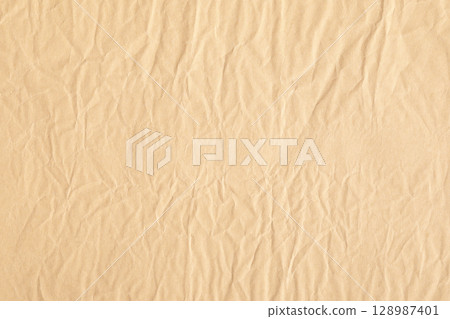 Yellow crumpled  paper material texture 128987401