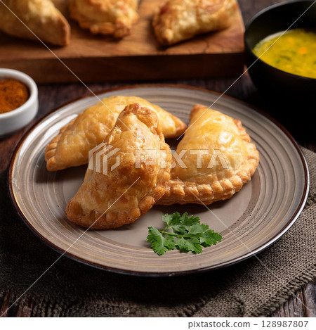 Crispy Curry Puff with Spicy Filling 128987807