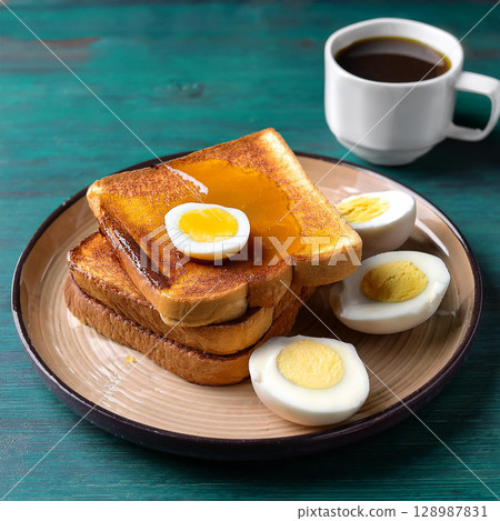 Kaya Toast with Butter and Soft Eggs 128987831