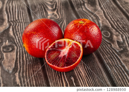 Red sweet juicy orange fruit Red sweet juicy orange fruit 128988930