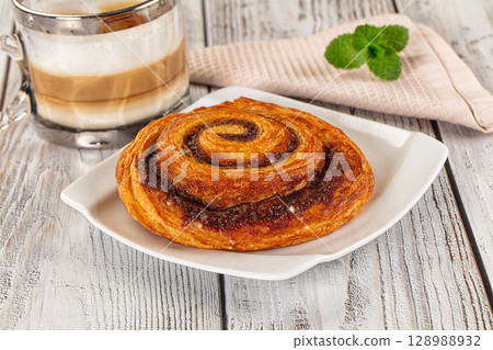 Homemade cinnabon swirl pastry with cinnamon Homemade cinnabon swirl pastry with cinnamon 128988932