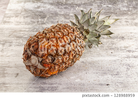 Sweet ripe juicy pineapple fruit Sweet ripe juicy pineapple fruit 128988959