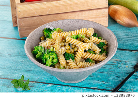 Italian vegan pasta fusilli with broccoli 128988976