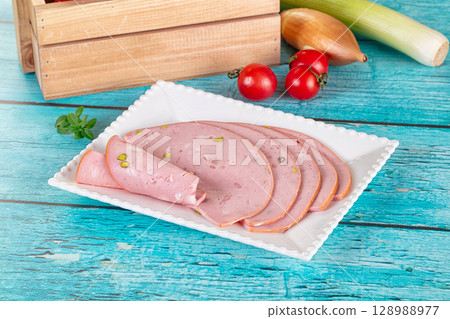 Delicous sliced mortadella sausages with pistachios 128988977