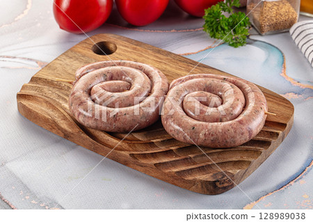 Raw meat pork and beef swirl sausages 128989038