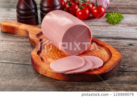 Boiled sausage with slices for breakfast 128989079