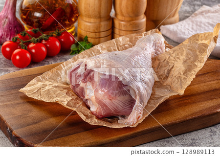 Raw uncooked turkey leg drumstick Raw uncooked turkey leg drumstick 128989113