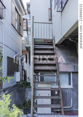 Outdoor stairs in a retro apartment Outdoor stairs in a retro apartment 128989232