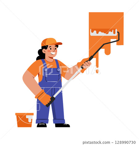 Female Painter Using Roller Brush Applying Orange Paint on Wall in Overalls and Cap 128990730