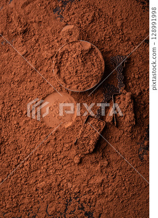 Cocoa powder chocolate texture background 128991998