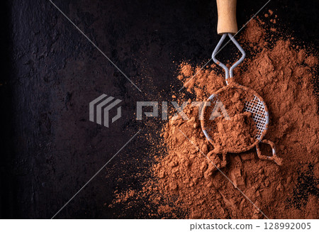 Cocoa powder chocolate texture background 128992005