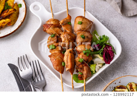 Chicken skewers kebab with vegetables 128992117