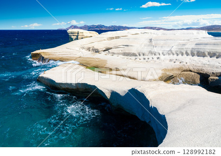White chalk cliffs in Sarakiniko, Milos island, Cyclades, Greece White chalk cliffs in Sarakiniko, Milos island, Cyclades, Greece 128992182