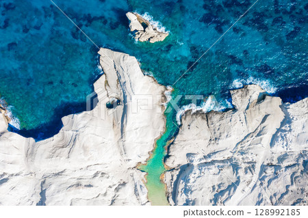 White chalk cliffs in Sarakiniko, Milos island, Cyclades, Greece 128992185