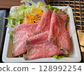 A colorful salad with marbled Wagyu roast beef from a high-end yakiniku restaurant 128992254
