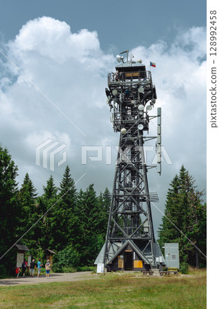 21 July 2025, Cerna Hora in Janskie Lazne, Czech Republic. Observation tower, 5G GSM mast on the top of Cerna hora in the Krkonose Mountains, summer time 128992458