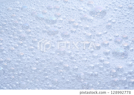 Soap foam with bubbles. The texture of the cleansing product. 128992778