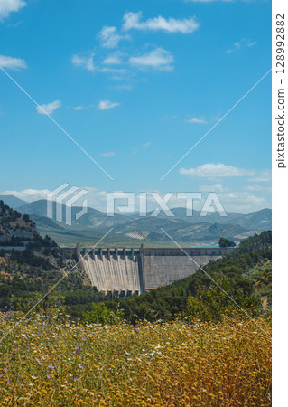 Iznajar dam seen from Cuevas de San Marcos Iznajar dam seen from Cuevas de San Marcos 128992882