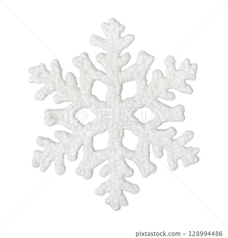 A Christmas decorative tree ornament in the shape of a white snowflake on a string, isolated on a white background with clipping path. Design element for Christmas card 128994486