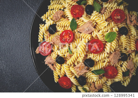 Tuna salad, fusilli pasta, olives and cherry, olive oil, homemade, Tuna salad, fusilli pasta, olives and cherry, olive oil, homemade, 128995341