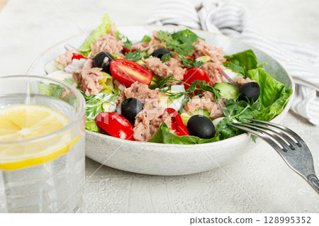 salad with canned tuna, vegetable salad with quail eggs, lettuce and romaine leaves, red onion, cherry tomatoes, olives, keto food, healthy eating, salad with canned tuna, vegetable salad with quail eggs, lettuce and romaine leaves, red onion, cherry tomatoes, olives, keto food, healthy eating, 128995352