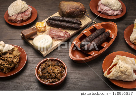 assortment of traditional Portuguese tapas snack food on restaurant table in porto portugal 128995837