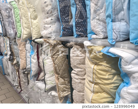 Cozy bedding collection lined up for a delightful shopping experience Cozy bedding collection lined up for a delightful shopping experience 128996049