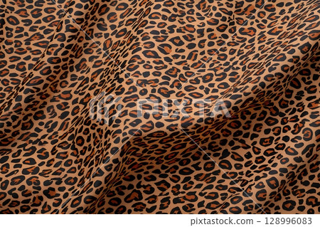 Leopard print fabric texture in brown and black, animal spot pattern for fashion design or upholstery background 128996083