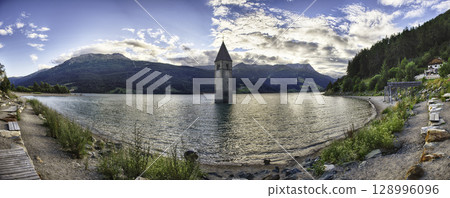 The iconic submerged Church Tower of Graun, Lake Reschensee, Italy 128996096
