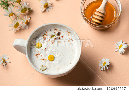 Chamomile moon milk, chamomile and honey tea latte 128996317