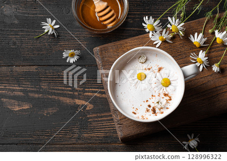 Chamomile moon milk, chamomile and honey tea latte 128996322