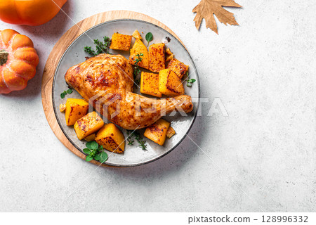 Autumn meal: roasted chicken and pumpkin Autumn meal: roasted chicken and pumpkin 128996332