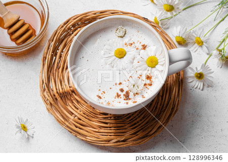 Chamomile tea and honey latte coffee. 128996346