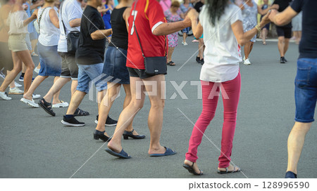 Group of people performing a traditional Bulgarian folk dance Horo. Horo is a communal dance in Bulgaria, typically performed for enjoyment at festive gatherings Group of people performing a traditional Bulgarian folk dance Horo. Horo is a communal dance in Bulgaria, typically performed for enjoyment at festive gatherings 128996590