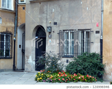 colorful tenements in the alley of the old town in Warsaw Poland colorful tenements in the alley of the old town in Warsaw Poland 128996946