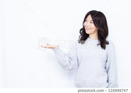 A woman giving an introduction A woman giving an introduction 128998747