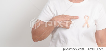 Elderly woman with Peach Ribbon for September Uterine Cancer Awareness month, Endometrial Cancer, Gynecologic, Uterus and Ovaries, Endometriosis, June Vaginal cancer and World cancer day concept Elderly woman with Peach Ribbon for September Uterine Cancer Awareness month, Endometrial Cancer, Gynecologic, Uterus and Ovaries, Endometriosis, June Vaginal cancer and World cancer day concept 129001724