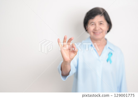 Elderly with blue Ribbon for Prostate Cancer Awareness month, April Child Abuse Prevention, National Bullying, September Addiction Recovery, May Chronic Fatigue Syndrome and January Human Trafficking Elderly with blue Ribbon for Prostate Cancer Awareness month, April Child Abuse Prevention, National Bullying, September Addiction Recovery, May Chronic Fatigue Syndrome and January Human Trafficking 129001775