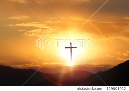 Bright light background and cross background symbolizing Jesus' sacrifice, passion, death and resurrection, Holy Week Easter concept 129001912
