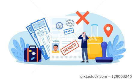 Open passport with stamp denied on travel visa, luggage, frustrated emigrant. Depressed man upset about refused entry. Travel abroad rejected. International vacation or emigration procedure 129003240