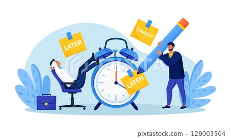 Procrastinating lazy businessman sitting in office with his legs up on alarm watch. Big sticky note with the word later on alarm clock. Procrastination and laziness, unproductive employee. Break time 129003504