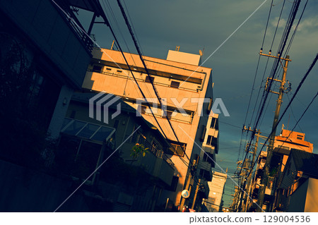 Sunset-soaked streetscape 129004536