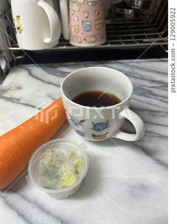 Coffee and carrots in the kitchen 129005922