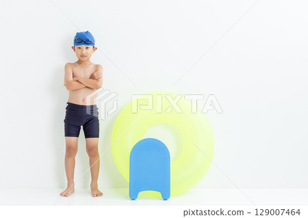 Smiley boy in swimsuit 129007464