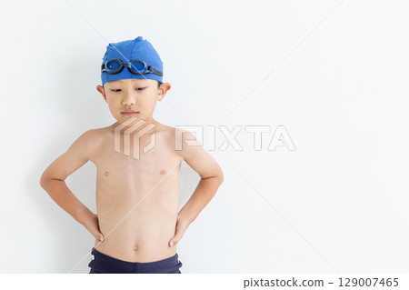 Smiley boy in swimsuit 129007465