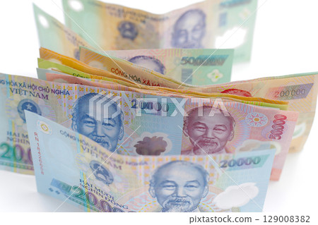 Vietnamese dong banknotes. Money concept Vietnamese dong banknotes. Money concept 129008382