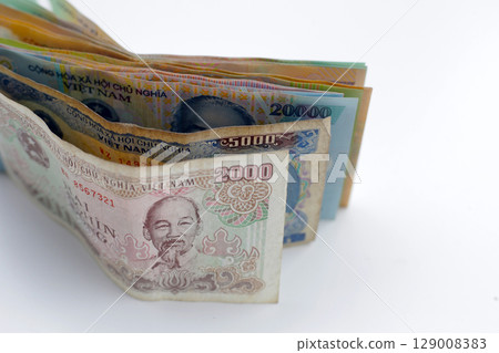 Vietnamese dong banknotes. Money concept Vietnamese dong banknotes. Money concept 129008383